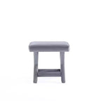 Pouf tapissé de velours