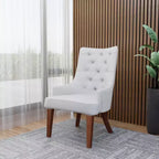 Chaise de salle à manger rembourrée en velours cuir avec haut dossier capitonné de losanges et pieds en bois d'hévéa teinté